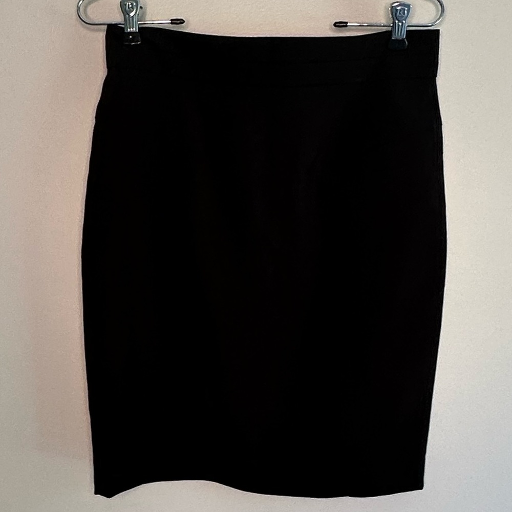 Black above-the-knee pencil skirt is great for the office.